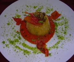 Vellutata di pomodori con soufflè di patate presso il Ristorante Il Portico