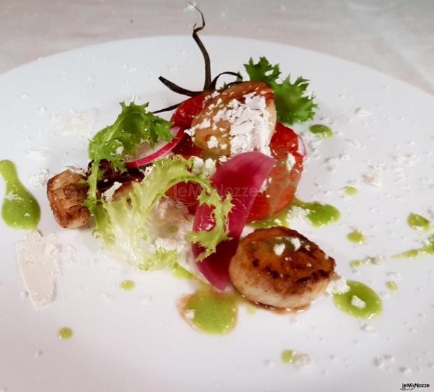 Ristorante Aquamarina - Capesante scottate con misticanza