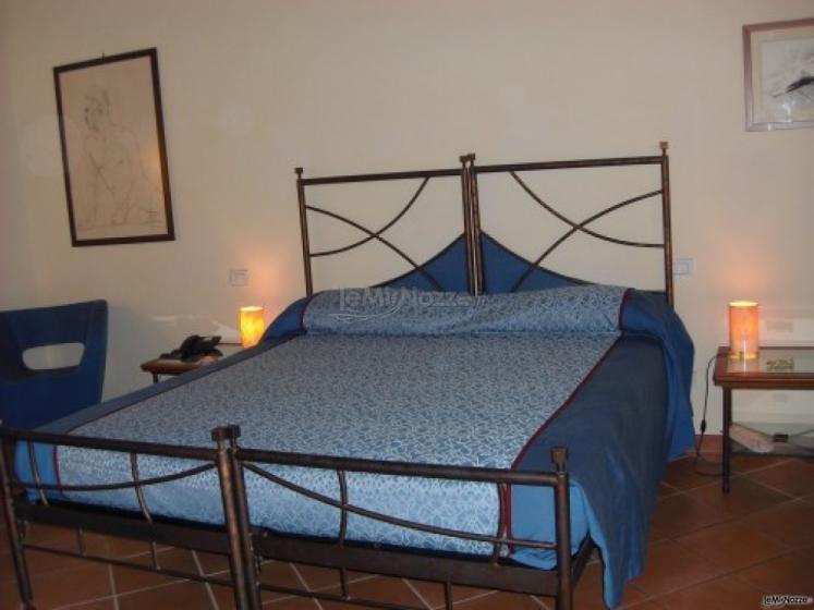 Interno camera da letto per prima notte di nozze presso l'Hotel Caiammari
