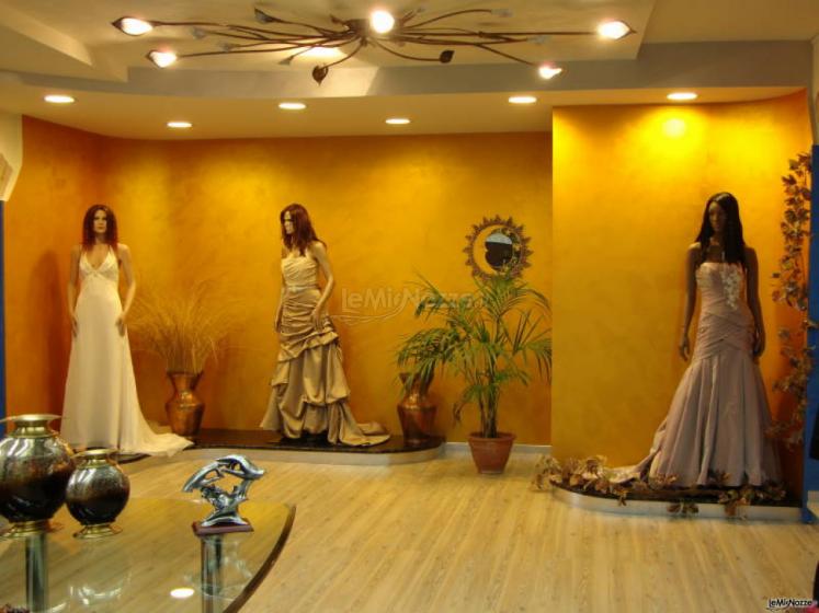 Originali modelli di abiti da sposa dai colori tenui e dai tessuti pregiati